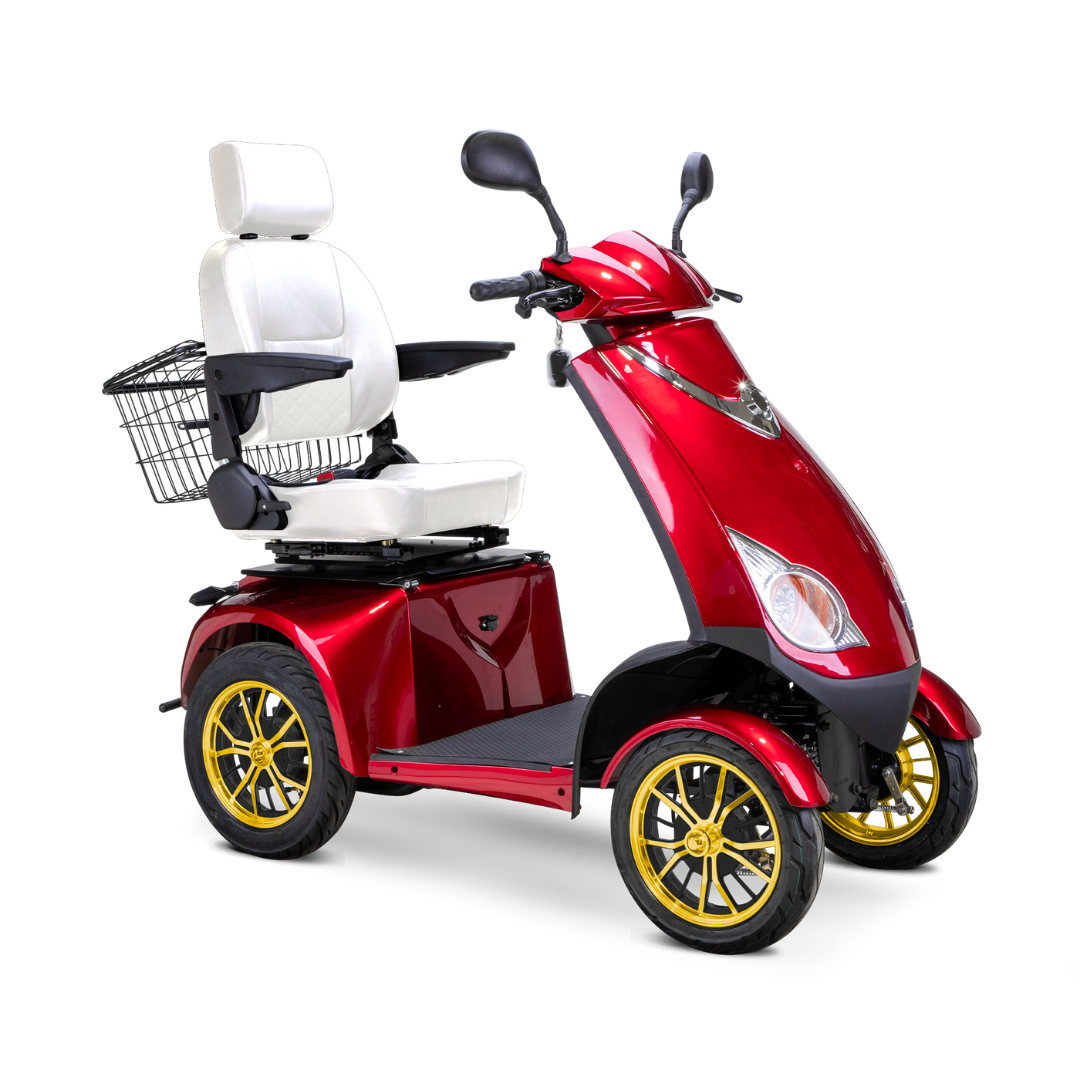 The Bespoke Platinum Recreational 4-Wheel Scooter with Electric Brake Assist features a shiny red finish, gold rims, white cushioned seat with armrests and headrest, mirrors on handlebars, high-performance motor, and rear black wire basket.